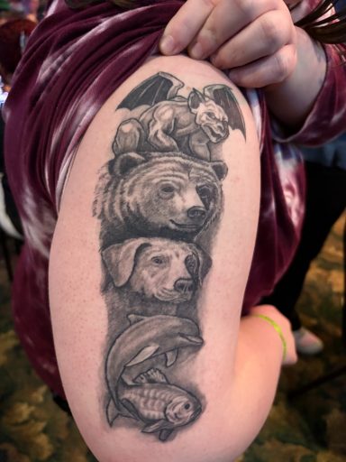 Mark's Art LLC Rapid City SD - intricate black and grey totem tattoo with bear, gargoyle, dog, dolphin, and fish